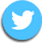 Blue Twitter bird logo on a light blue circular background.