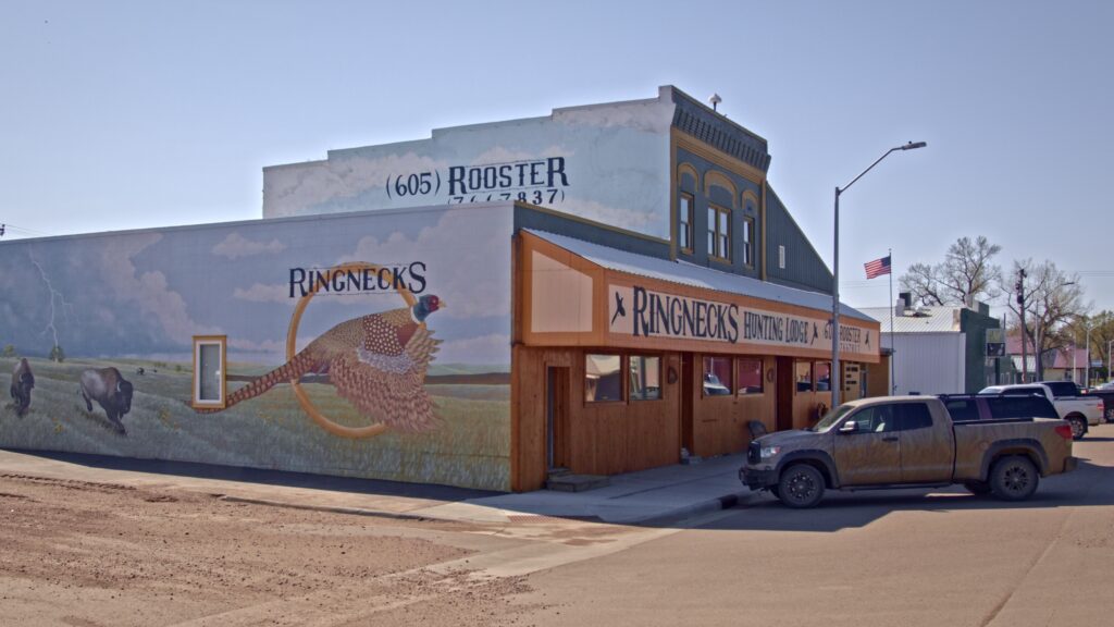 North view of Ringnecks Lodge showing a hand painted mural of pheasant and bison.